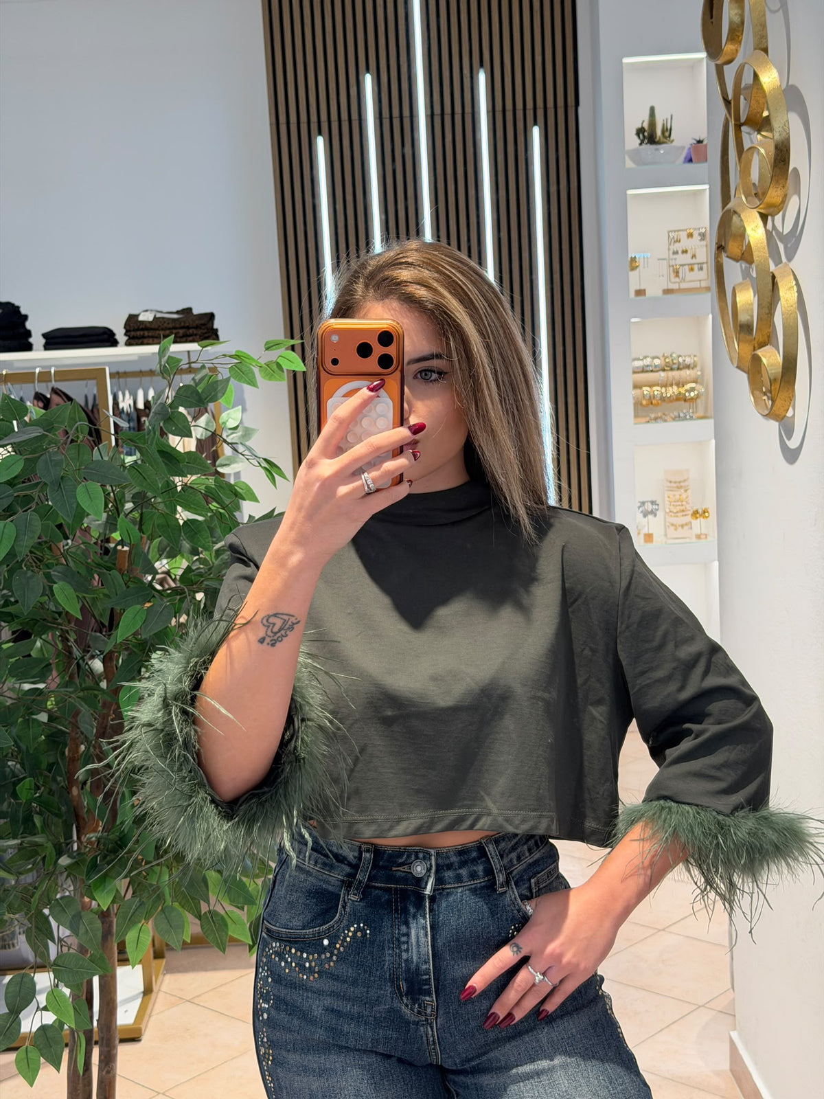 Maglia con piume
